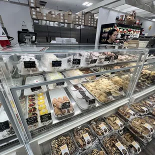 Other half of the bakery section with cookies, cake, pops, and more