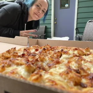 A hottie, and chicken and waffle pizza.