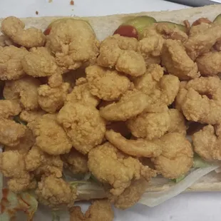 This is a must try overflowing shrimp poboy for only $7.99!!