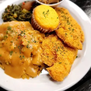 Catfish Dinner with Dressing, Collard Greens, Fried Cabbage and Corn Bread