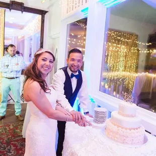 Marshmallow Fondant Three Tiered Round Wedding Cake.