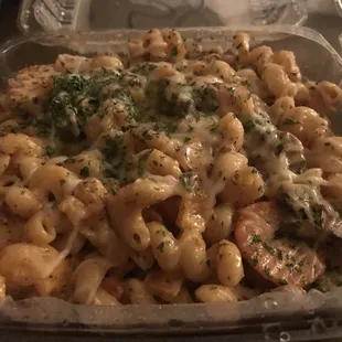 a pasta dish in a plastic container