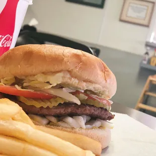 Burger and fries with drink