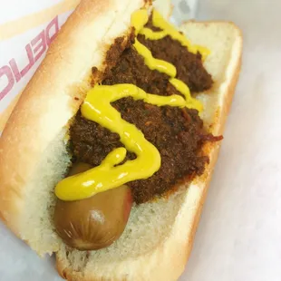Hot dog with chili and mustard