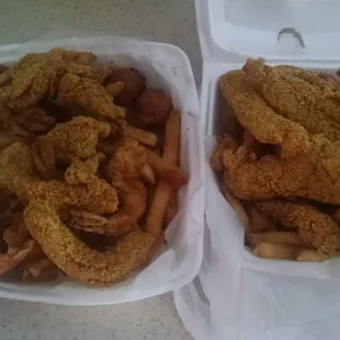 two baskets of fried fish and fries