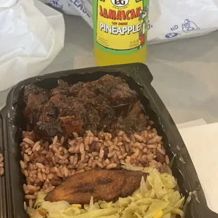 Oxtail, cabbage, rice &amp; peas