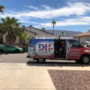 D&amp;H truck in our driveway while their guy was on our roof sweating under the 100° sun.