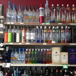 a variety of bottles on shelves