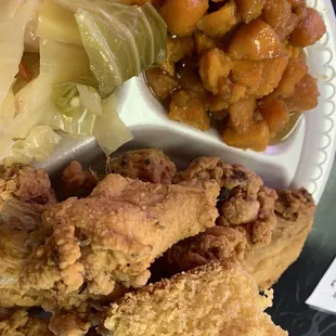 Lunch is served - fried wings, candied yams and smothered cabbage.
