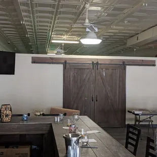 a long table with wine glasses on it