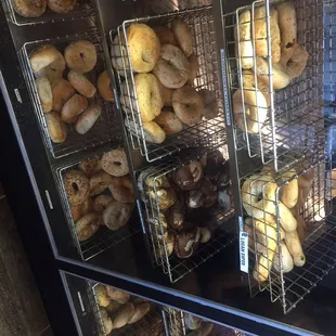 a variety of bagels on display