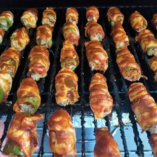 Don&apos;t forget to order our famous, bacon wrapped jalapenos stuffed with cream cheese and tender, hickory smoked brisket or pulled pork!