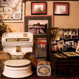 a toilet with pictures on the wall