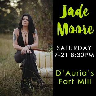 a woman sitting on a couch in a field