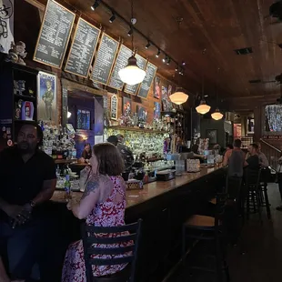people sitting at a bar