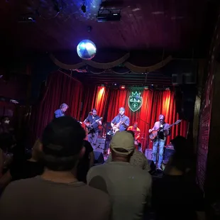a band performing on stage