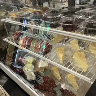 a display case filled with desserts