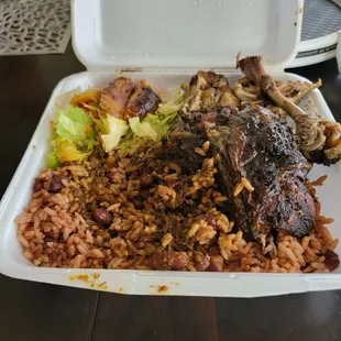 Lg. Jerk Chicken with rice and peas, plantains, salad