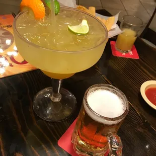 a margarita with a lime garnish