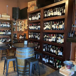 a wine shop with a wine rack full of wine bottles