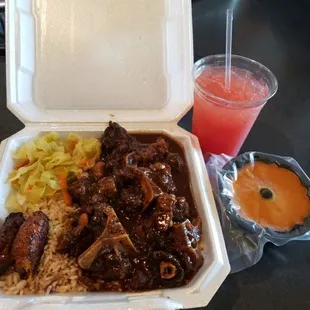 Oxtail, cabbage, rice and peas, callalou, butter rum cake, and a Jamaican Sun Rise