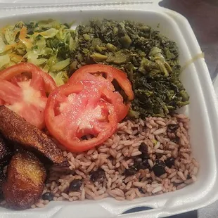 Collard, cabbage, plantains, beans and rice w/ a few tomatoes....