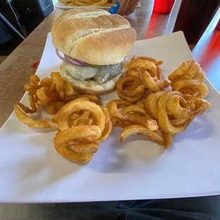 a burger and onion rings