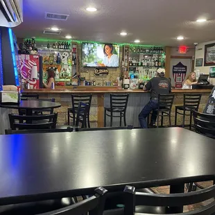 people sitting at the bar