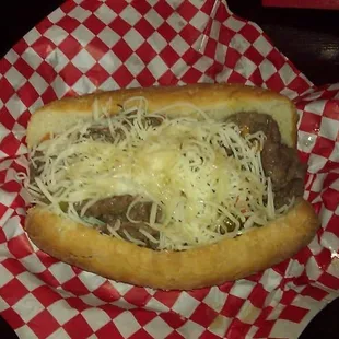 Slowly Roasted &amp; thinly sliced Italian Beef on a French bread roll with Au Jus, Giardiniera spices &amp; Mozzarella cheese!