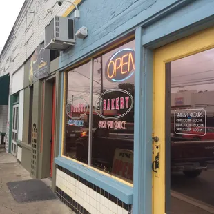 Front of bakery... Right by blanco cafe