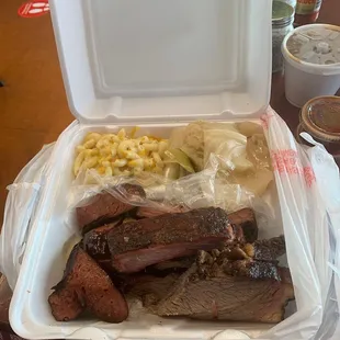 Sausage, pork ribs, and brisket with cabbage and Mac!!!