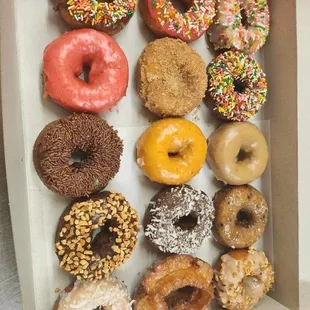 a variety of donuts in a box