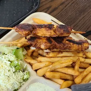 chik kababs, salad, dressing and fries