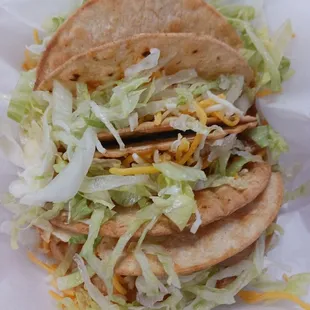 4 tacos, 2 ground beef and 2 chicken