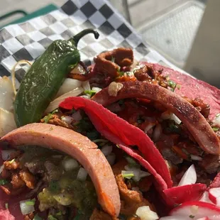 The "Barbie" tacos with asada and al pastor