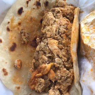 Jam packed chorizo and egg taco for two bucks!!