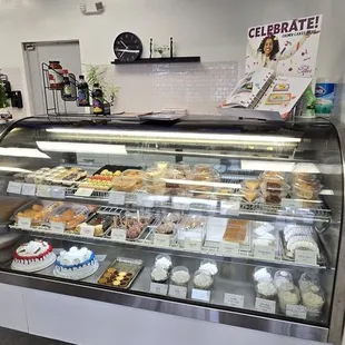 Bakery items and menu on the TV