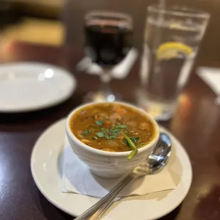 a bowl of soup on a plate