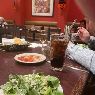 Caesar Salad and what's left of their yummy marinara sauce