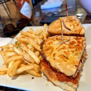 Chicken Parmesan sandwich with fries