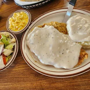 Chicken Fried Steak, side salad and mac. They threw on mashed potatoes by accident,  but they were good.