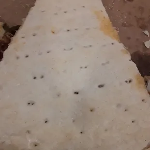 a slice of pizza on a plate