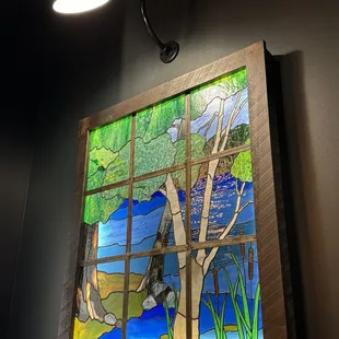 One of the many pretty stained glass windows inside.