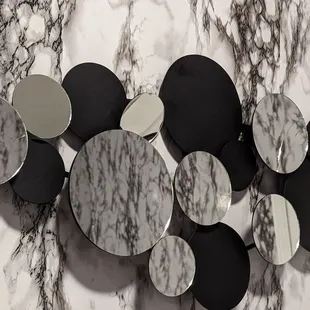 Mirror decoration above sink, 3 mirror pieces has several cracks