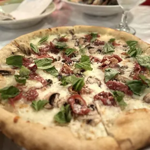 Truffle pizza (added fresh basil)