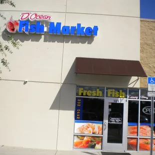 Store front, next to Dunkin&apos; Donuts, around the corner from Sams Club.