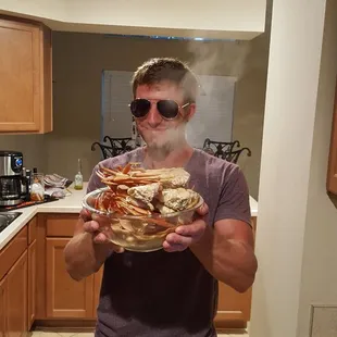 a man holding a plate of food