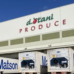 trucks parked in front of a building