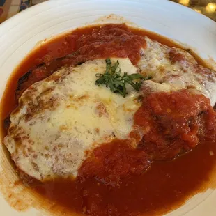 Eggplant parm with a light sauce . Service was amazing and I highly recommend coming to this restaurant!