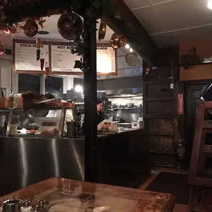 Scurrying around the kitchen to clean it fast